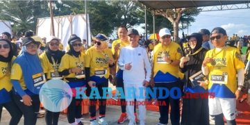 “Meretas Jejak di Pantai Pohon Cinta: Sport Tourism Half Marathon Pohuwato 2025”
