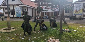 Usai Dandim Cup Race, Anggota Kodim 1313 Pohuwato Bersihkan Sampah Di Arena Sirkuit Non Permanen