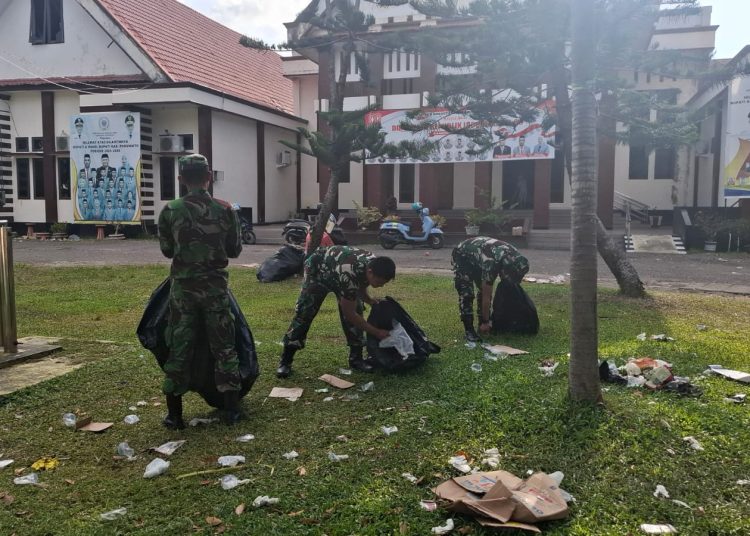 Usai Dandim Cup Race, Anggota Kodim 1313 Pohuwato Bersihkan Sampah Di Arena Sirkuit Non Permanen